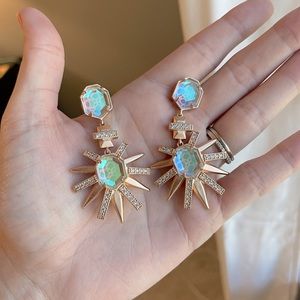 Kendra Scott Allie Earrings in gold with dichroic glass